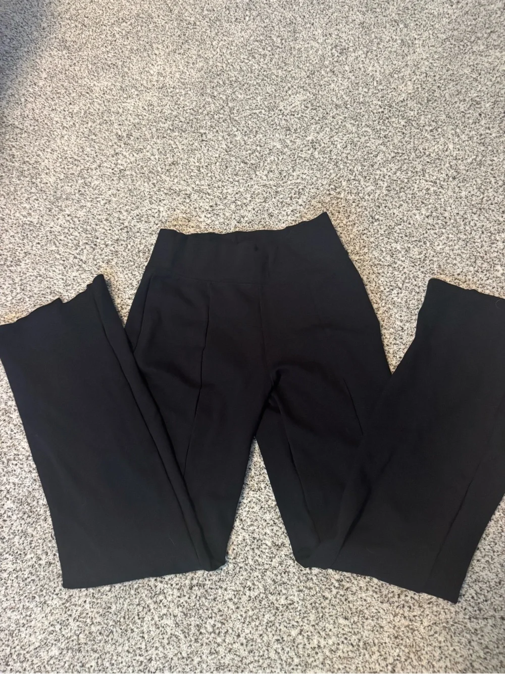 Abercrombie & Fitch Black leggings with flared bottom.